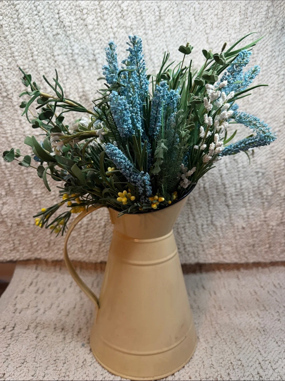Cream Metal Pitcher Vase with Blue and Green Floral Arrangement